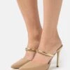 MICHAEL Michael Kors Jessa Mule- Muiltjes Met Hak - Camel 2 MICHAEL Michael Kors Jessa Mule- Muiltjes Met Hak - Camel -MICHAEL Michael Kors 33582fa351584198ad3d9235929e11a3