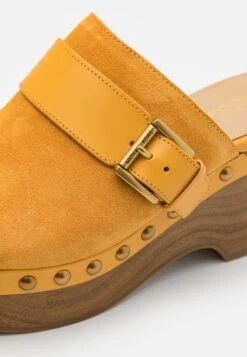 MICHAEL Michael Kors Rye - Clogs - Golden Rod 15 MICHAEL Michael Kors Rye - Clogs - Golden Rod -MICHAEL Michael Kors 4985daa565fb46769b5276e2f423697a