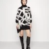 MICHAEL Michael Kors Illusion Check - Poncho - Black -MICHAEL Michael Kors 4ab1f939a18e427c87568fc468167484