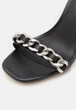 MICHAEL Michael Kors Clara Chain- Muiltjes Met Hak - Black 15 MICHAEL Michael Kors Clara Chain- Muiltjes Met Hak - Black -MICHAEL Michael Kors 8484914b16cc4e1fb480ff8ffa54b436