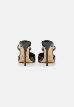 MICHAEL Michael Kors Jessa Mule - Muiltjes Met Hak - Black 12 MICHAEL Michael Kors Jessa Mule - Muiltjes Met Hak - Black -MICHAEL Michael Kors c69ac4e50e444a1e8f1995c656dde9a2