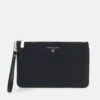 MICHAEL Michael Kors Jet Charm Wristlet - Clutch - Black 2 MICHAEL Michael Kors Jet Charm Wristlet - Clutch - Black -MICHAEL Michael Kors f71b5cf12a2541879a0a0756e7d72a0c